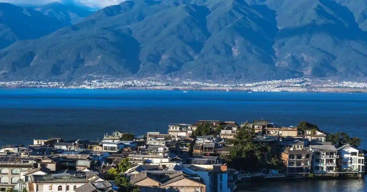 Breathtaking panoramic view of Dali Old Town with Erhai Lake in the distance.