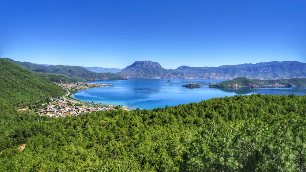 Visit the Lugu Lake viewing platform.