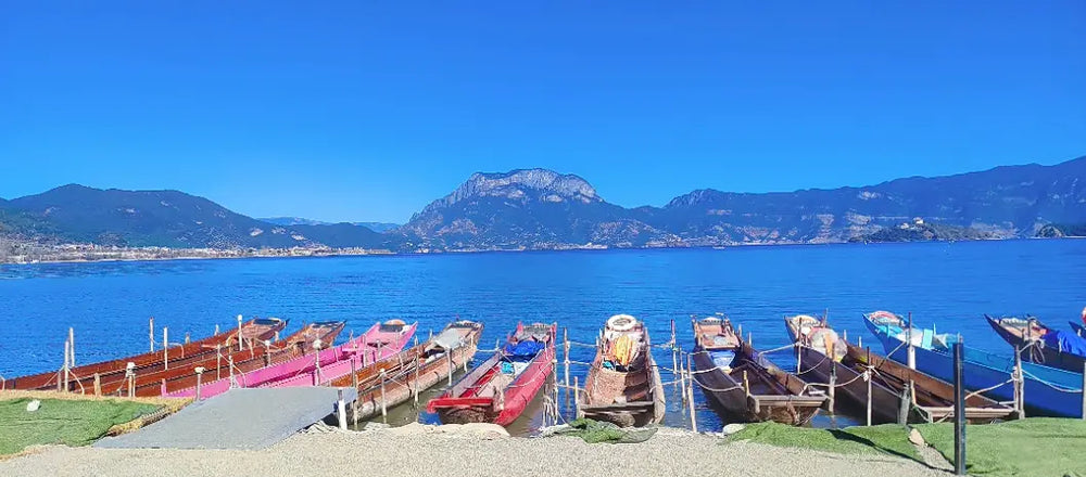 Enjoy a boat tour of Lugu Lake.